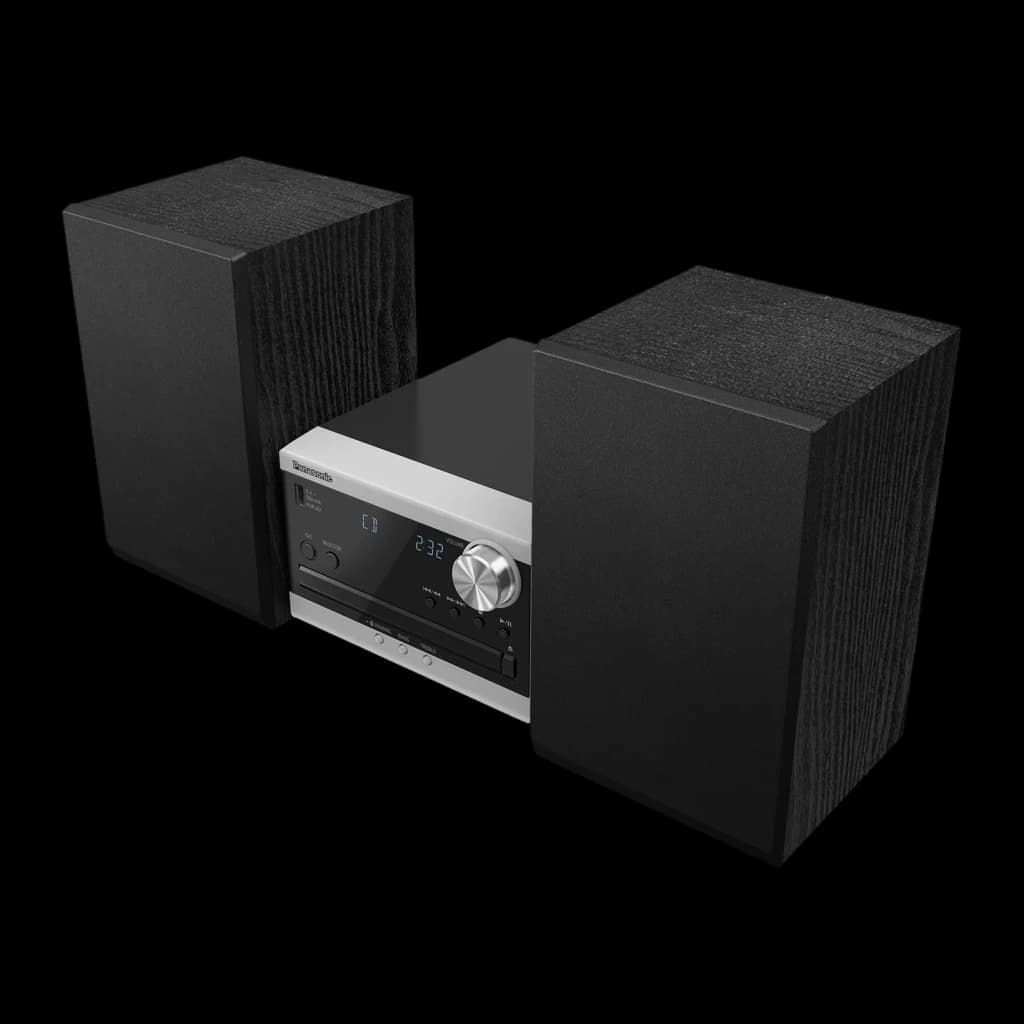 Panasonic Microcadena SC-PM272EG-S Plata, vista en perspectiva: unidad central plateada con display azul y altavoces negros