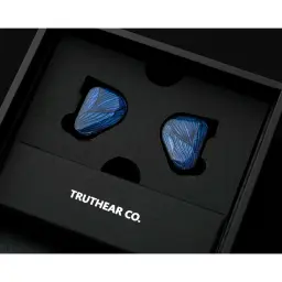 Truthear Zero Blue 2, detalhe: par de auriculares azuis no tabuleiro da caixa Truthear