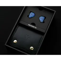 Truthear Zero Blue 2, caixa aberta: auriculares azuis no tabuleiro e bolsa preta com molas