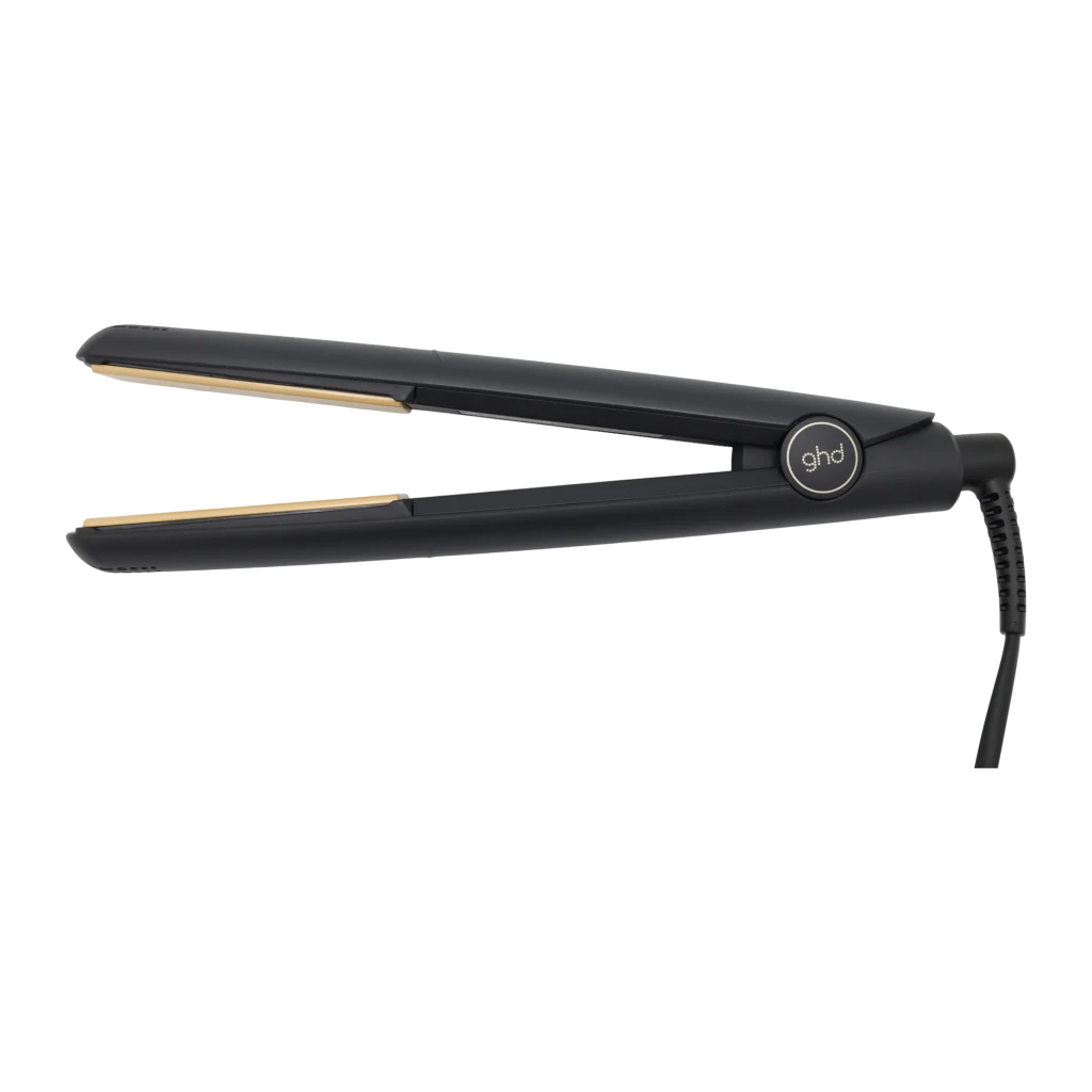 ghd Original Styler preto, vista lateral: chapinha aberta com placas douradas e logo ghd visível