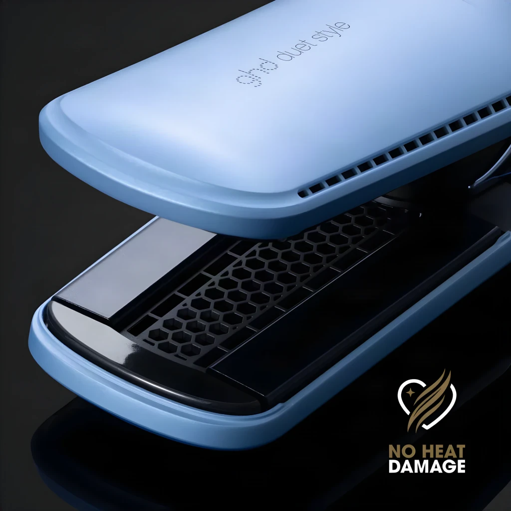 GHD Duet Style Vapor Azul, detalhe interior: placas abertas com grelha hexagonal e logo No Heat Damage