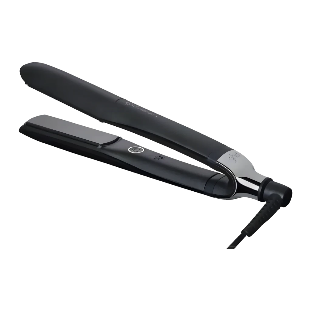 GHD Platinum+ Paddle Brush Gift Set preto, vista lateral: chapinha aberta na diagonal, placas e dobradiça cromada visíveis