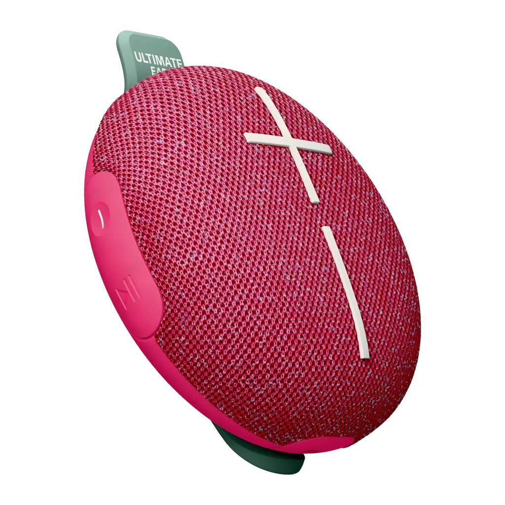 Altavoz portátil Ultimate Ears Miniroll IP67 12h Bluetooth Rosa, vista frontal en ángulo: rejilla rosa con cruz blanca y asa