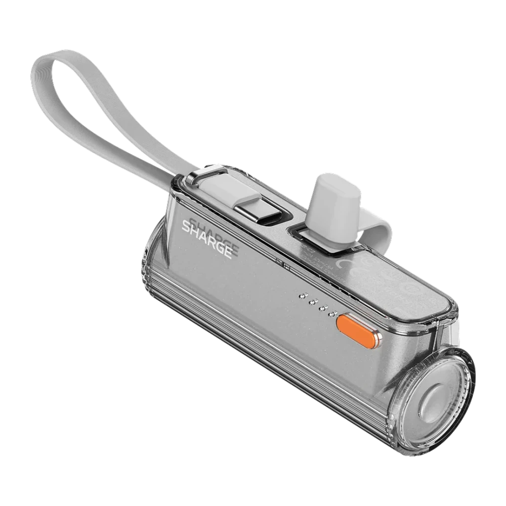 Batterie externe Sharge Flow Mini 2 Pro 5800mAh Argent Câble USB-C intégré 22,5W, vue diagonale: coque transparente, bouton