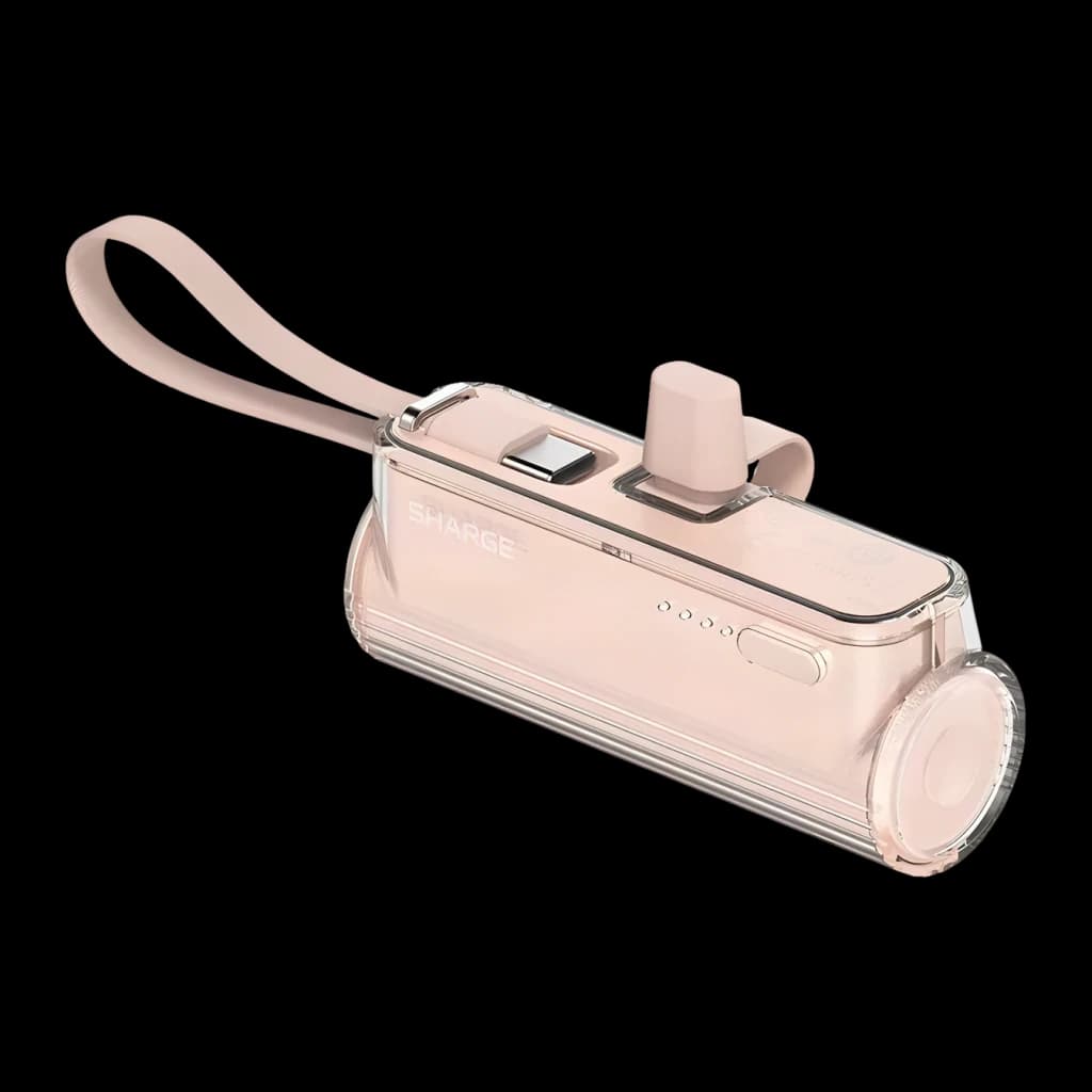 Batterie rose compacte transparente 5000 mAh, câble USB‑C intégré, indicateurs LED, bouton latéral et dragonne assortie, design cylindrique élégant