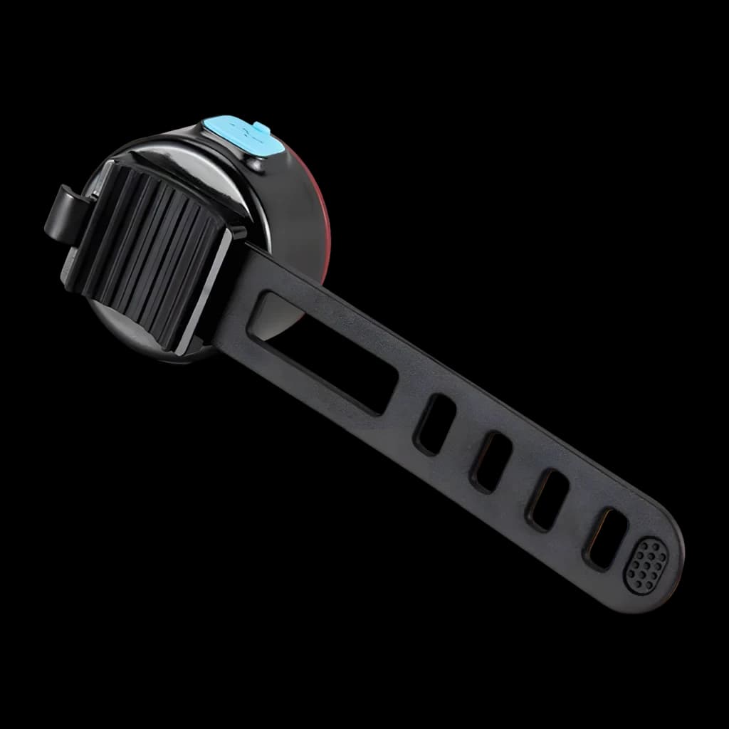 Luz trasera Superfire BTL05 Rojo 4h Micro-USB, vista trasera: correa de sujeción negra con ranuras y botón azul visible