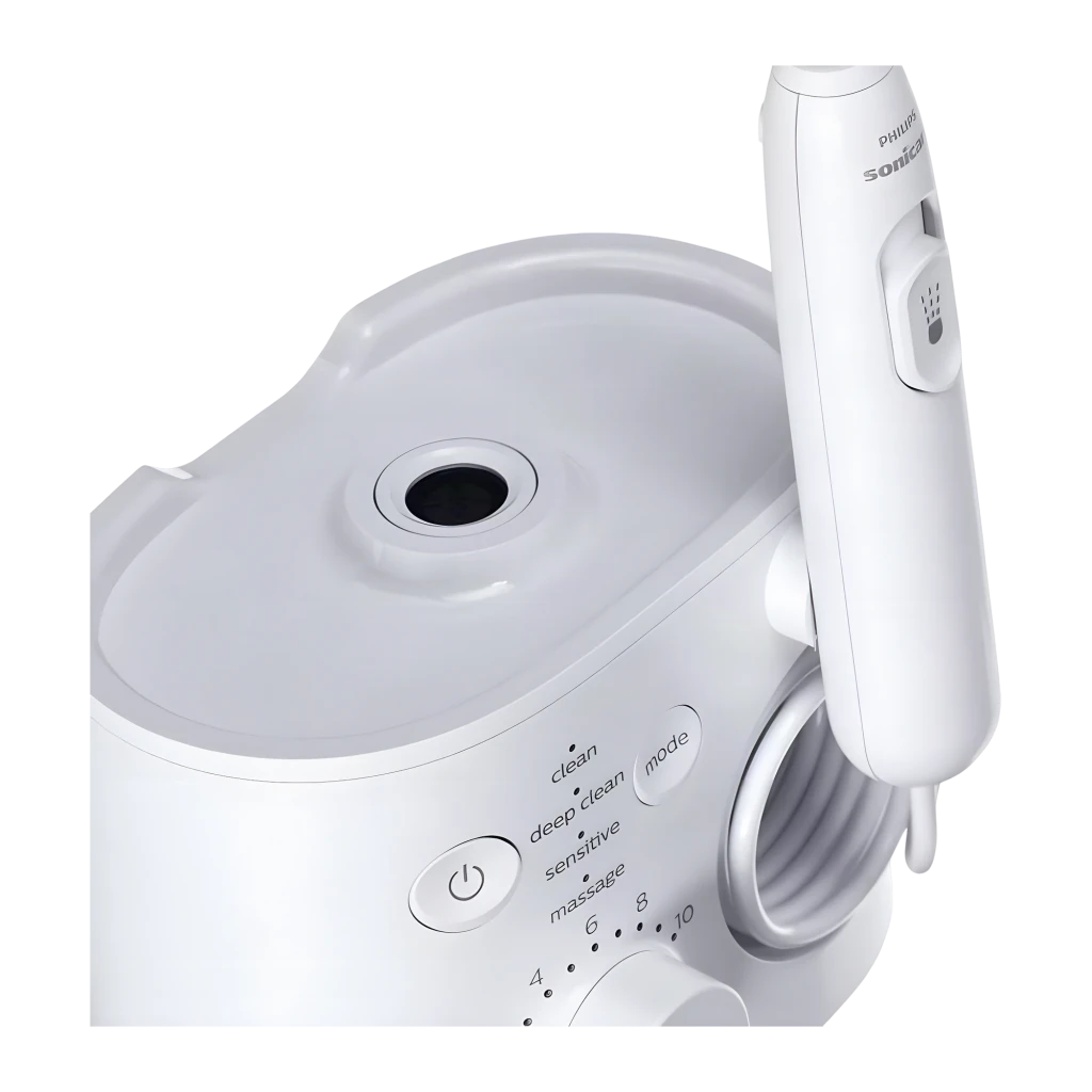 Irrigador dental Philips Sonicare Power Flosser 7000 Sin Cable Batería Blanco HX3911/40, detalle: depósito de agua, botón