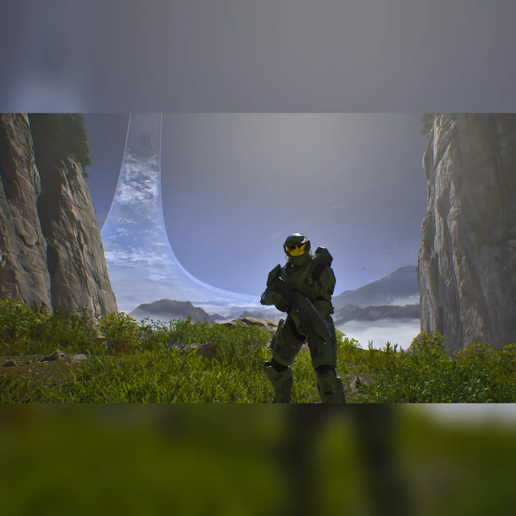 Jeu vidéo Microsoft Halo: Campaign Evolved Bleu Standard PS5, en jeu: Master Chief armé entre falaises avec l'anneau Halo