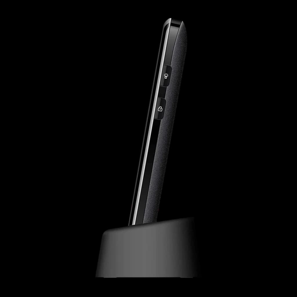 Maxcom Comfort MM730 2,2 pouces Noir 220x176px 2MP 800mAh, détail latéral: téléphone sur base de charge avec boutons lampe