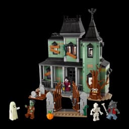Set de construction LEGO Creator Manoir Hanté 31167 736 pièces 9+ ans, vue de face: manoir vert avec tour sombre, portail