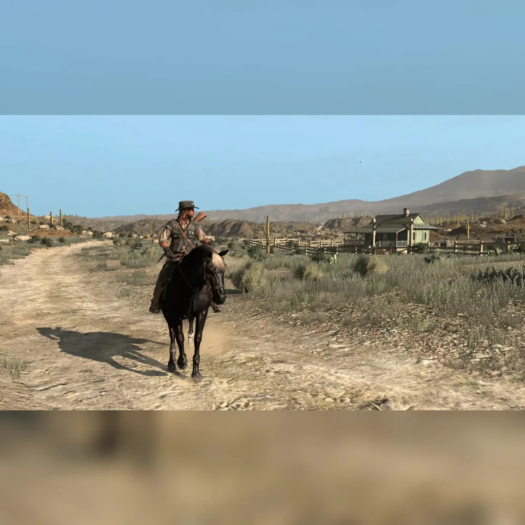 Videojuego Rockstar Games Red Dead Redemption PS4, en uso: vaquero a caballo en camino de tierra con pueblo del oeste
