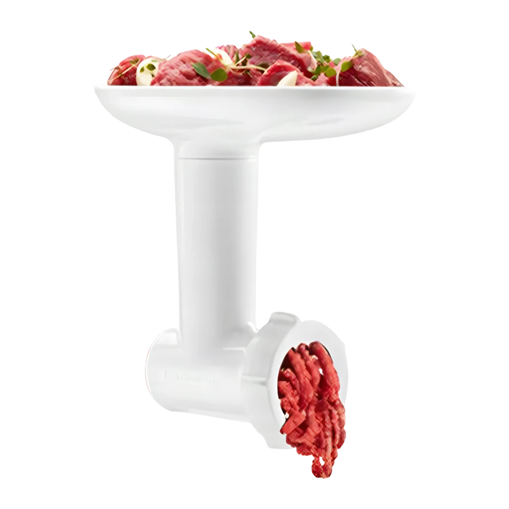 Picador de carne KitchenAid Blanco 5KSMFGA, detalle: bandeja con trozos de carne cruda y carne picada saliendo