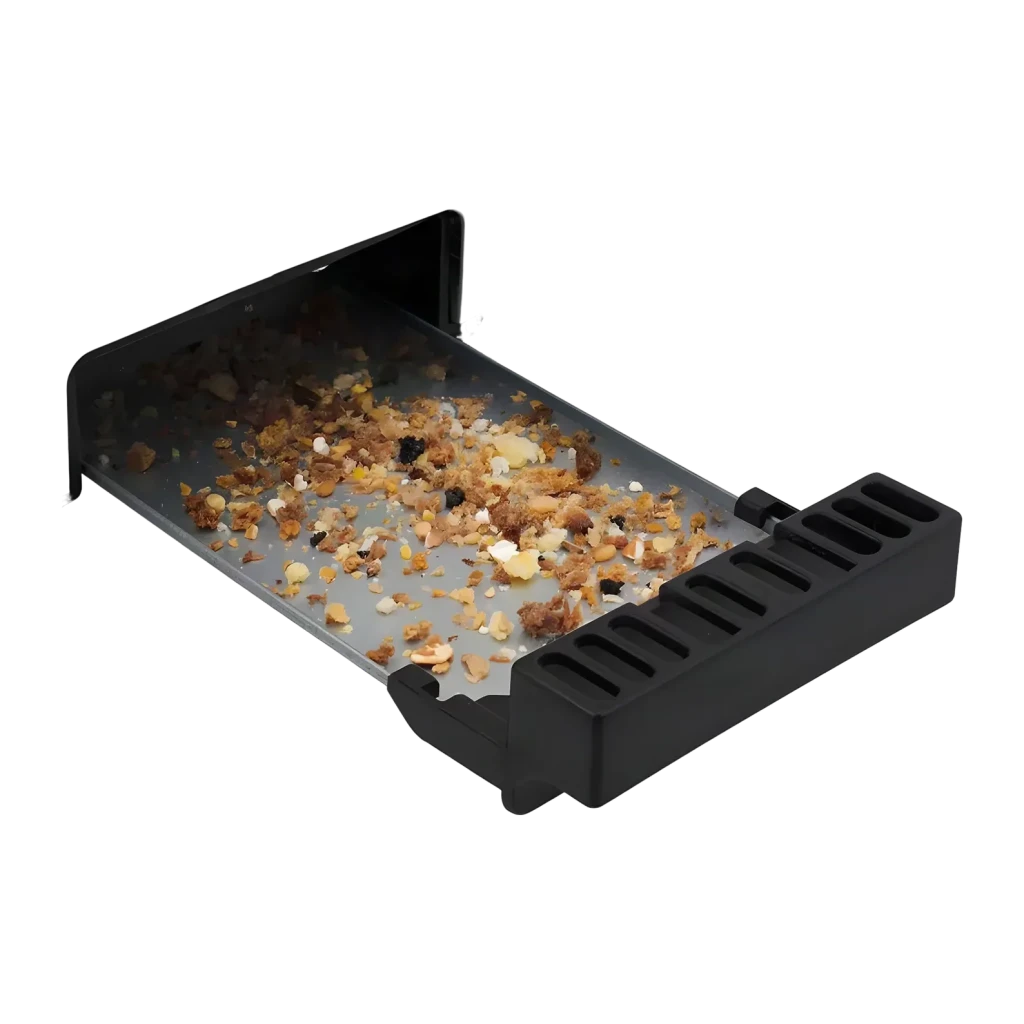 Tostadora Princess 1400W 4 Rebanadas Acero Inoxidable 142402, detalle: bandeja recogemigas extraída con migas acumuladas