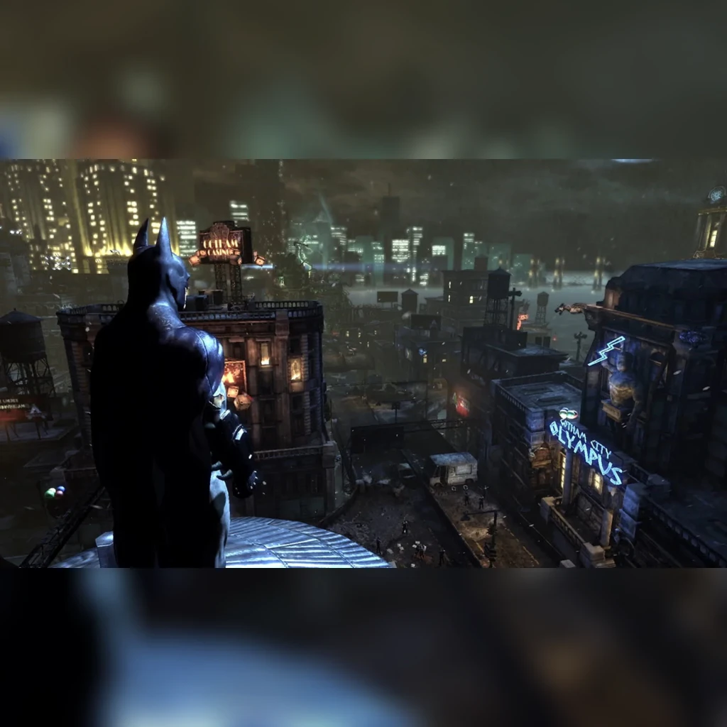 Videojogo Warner Bros. Games Batman Arkham Trilogy Nintendo Switch, em uso: Batman vigia Gotham City noturna de um telhado