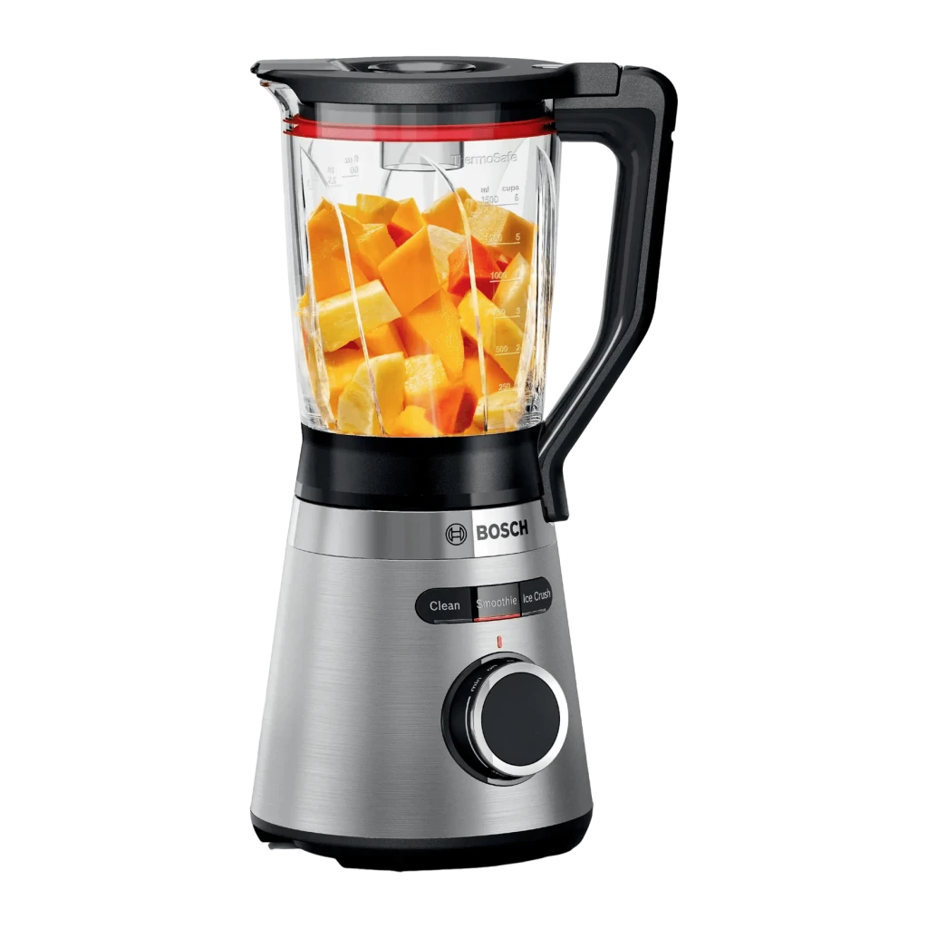 Batidora de vaso Bosch VitaPower 1.5L 1200W Negro MMB6382M, detalle: vaso con trozos de mango y mandos Clean Smoothie Ice