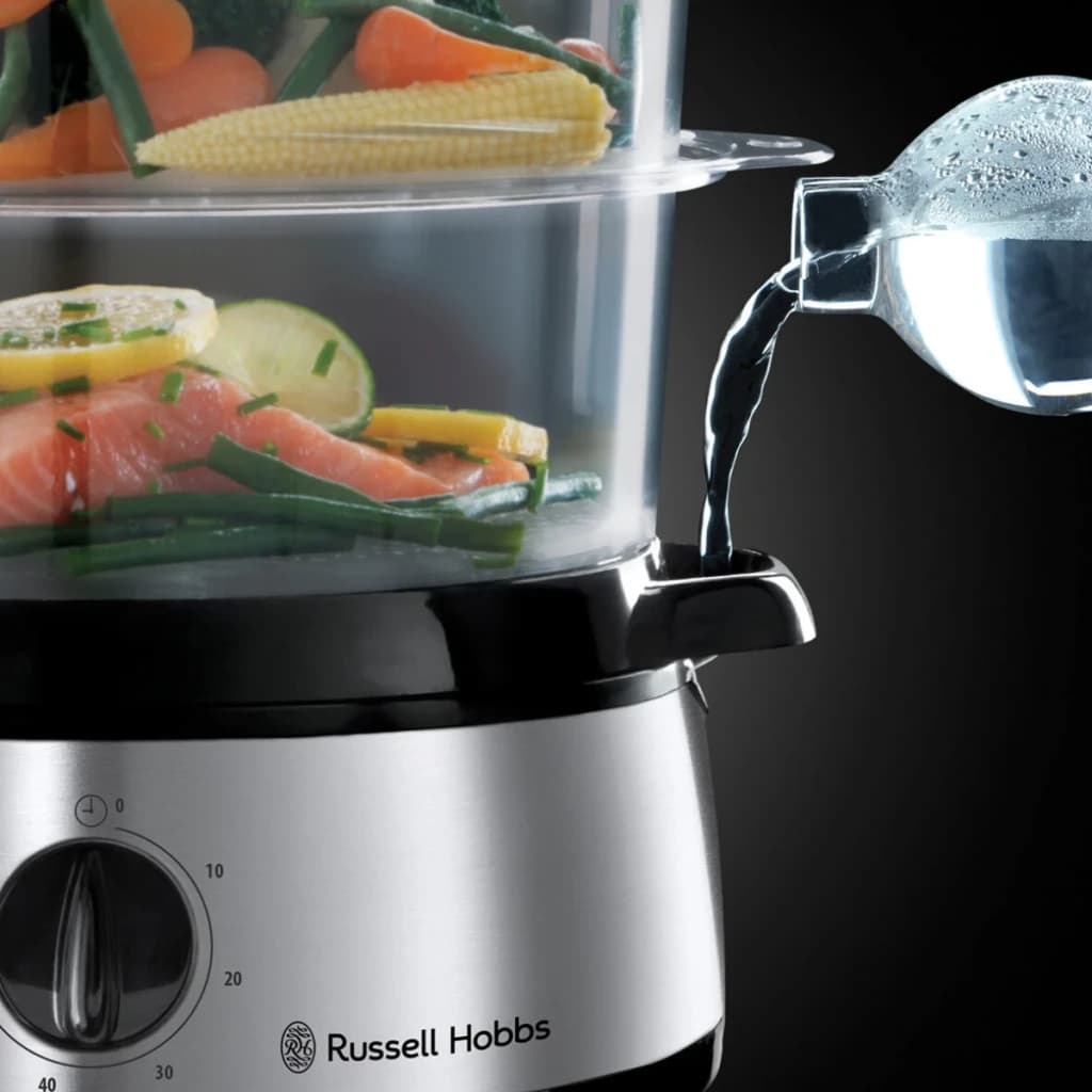 Vaporizador Russell Hobbs Cook@Home 9L 800W Preto 19270-56, em uso: água a ser vertida no reservatório lateral, cestos