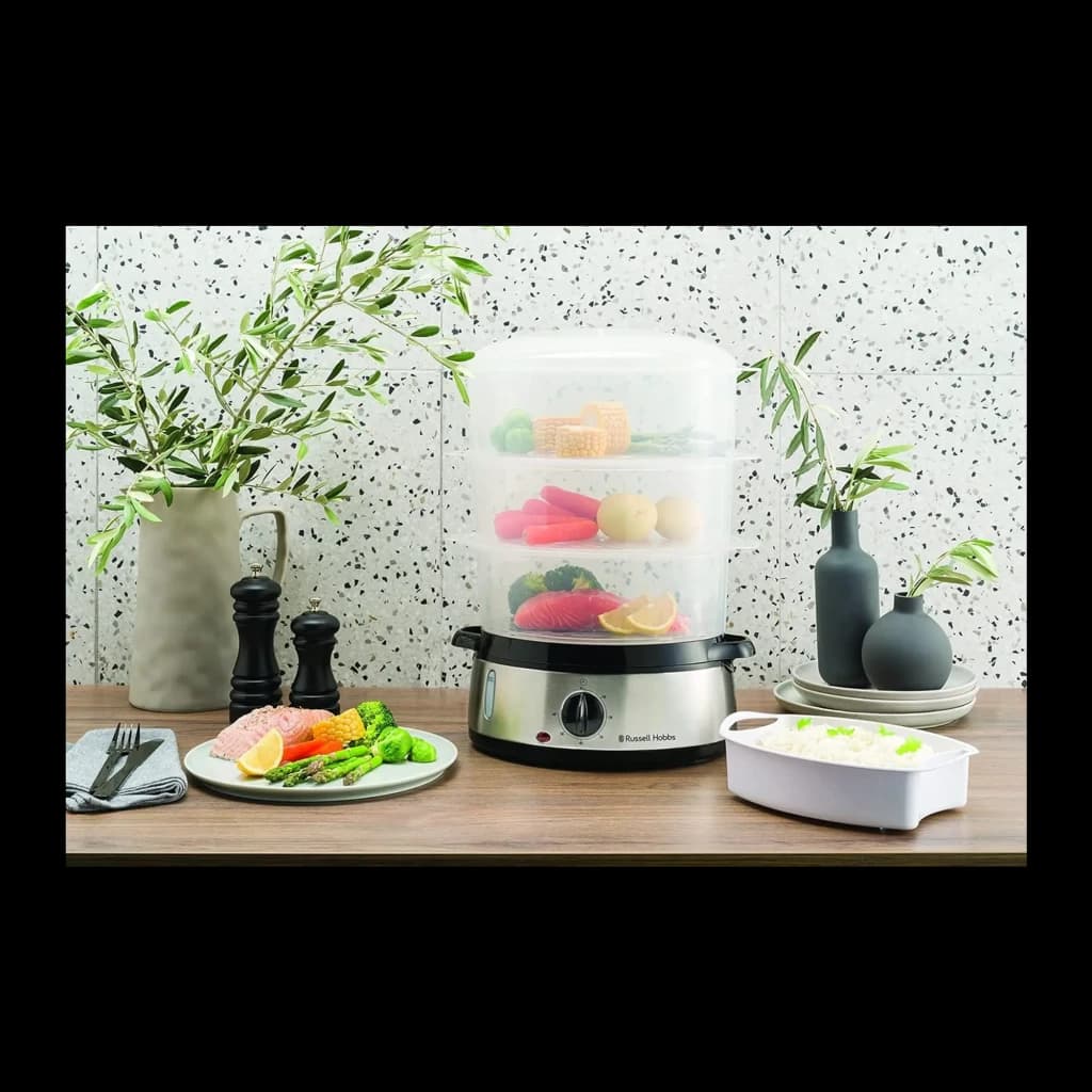 Vaporizador Russell Hobbs Cook@Home 9L 800W Preto 19270-56, em uso: 3 cestos transparentes com legumes e peixe sobre bancada