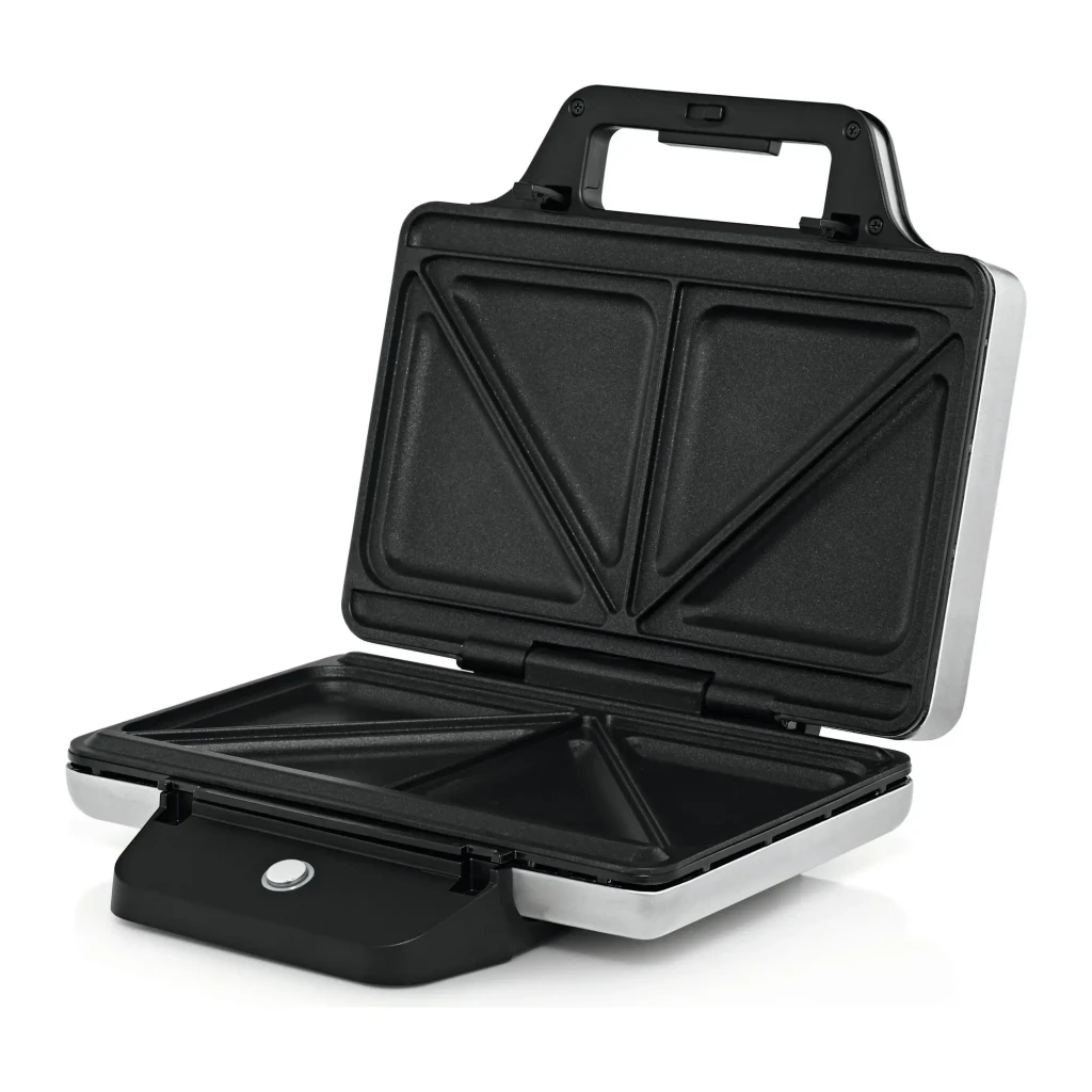 Sandwichera WMF Lono 800W 2 sándwiches Plata, abierta: placas antiadherentes triangulares superior e inferior visibles