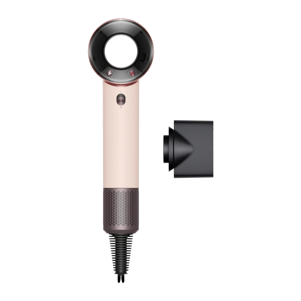 Secador de pelo Dyson Supersonic Travel 1220W Rosa, vista frontal: mango rosa, cabezal circular con borde rojo y accesorio