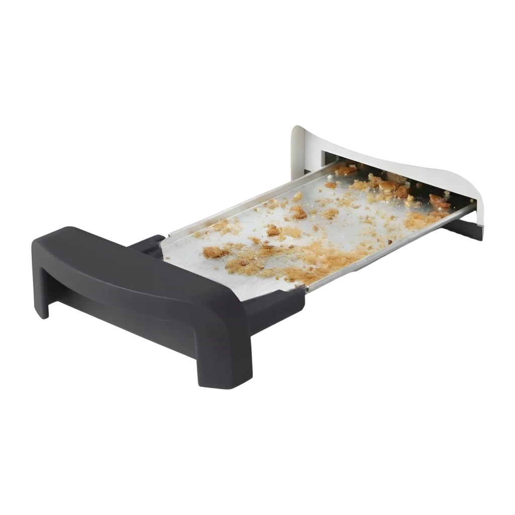 Grille-pain Black & Decker 1000W 1 fente Blanc BXTO1001E, détail: tiroir ramasse-miettes sorti avec miettes visibles