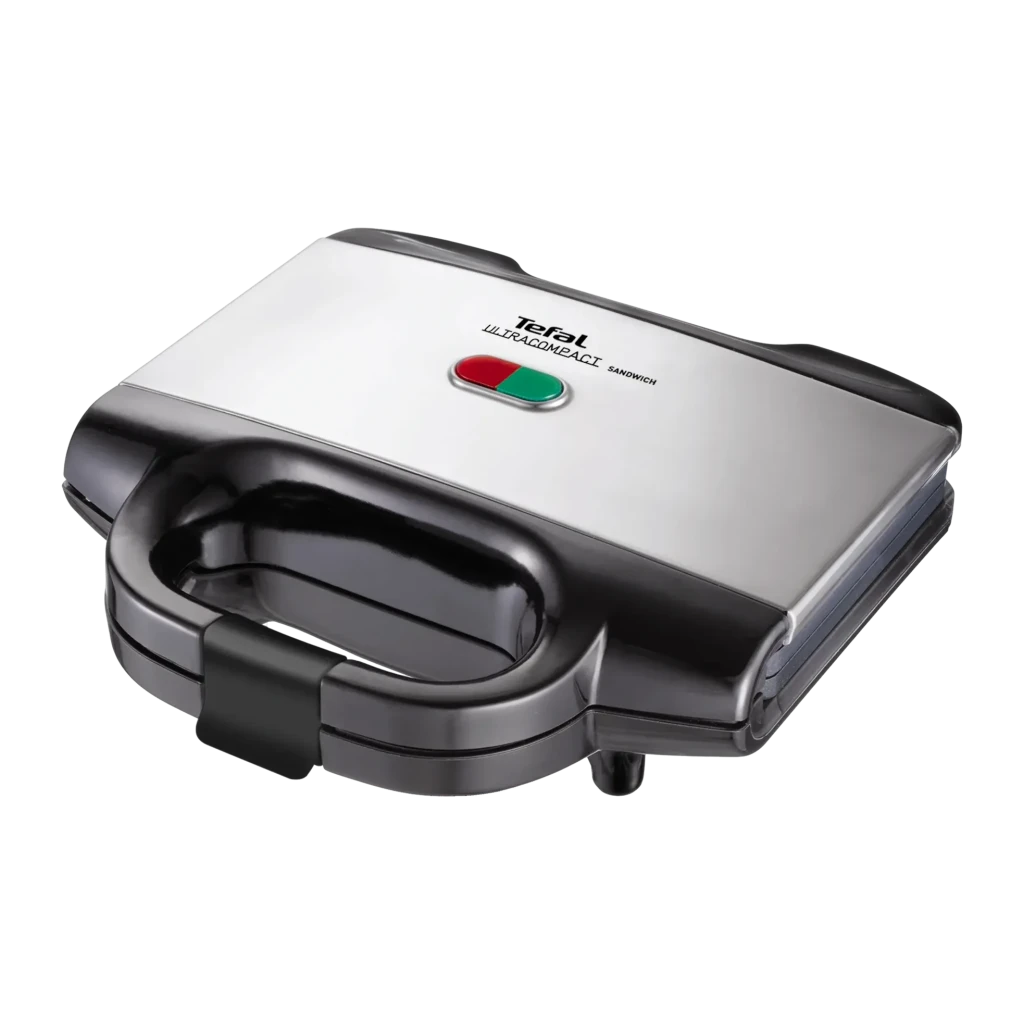 Sandwichera Tefal Ultracompact 700W Negro SM1552, vista frontal: tapa inox con logo, indicadores rojo y verde, asa negra