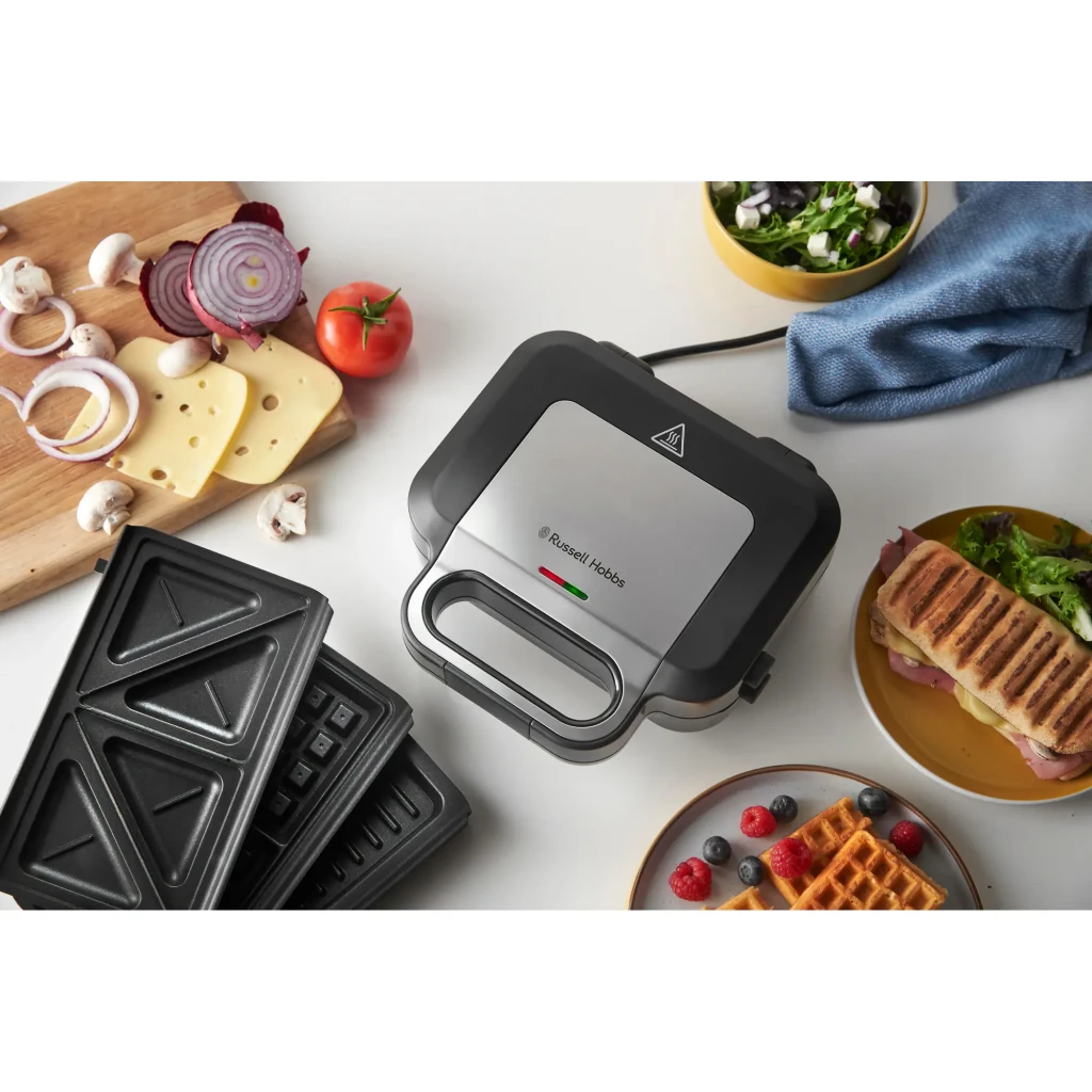 Sandwichera Russell Hobbs Creations 3 en 1 750W Acero Inoxidable 26810-56, en uso: vista cenital con placas intercambiables