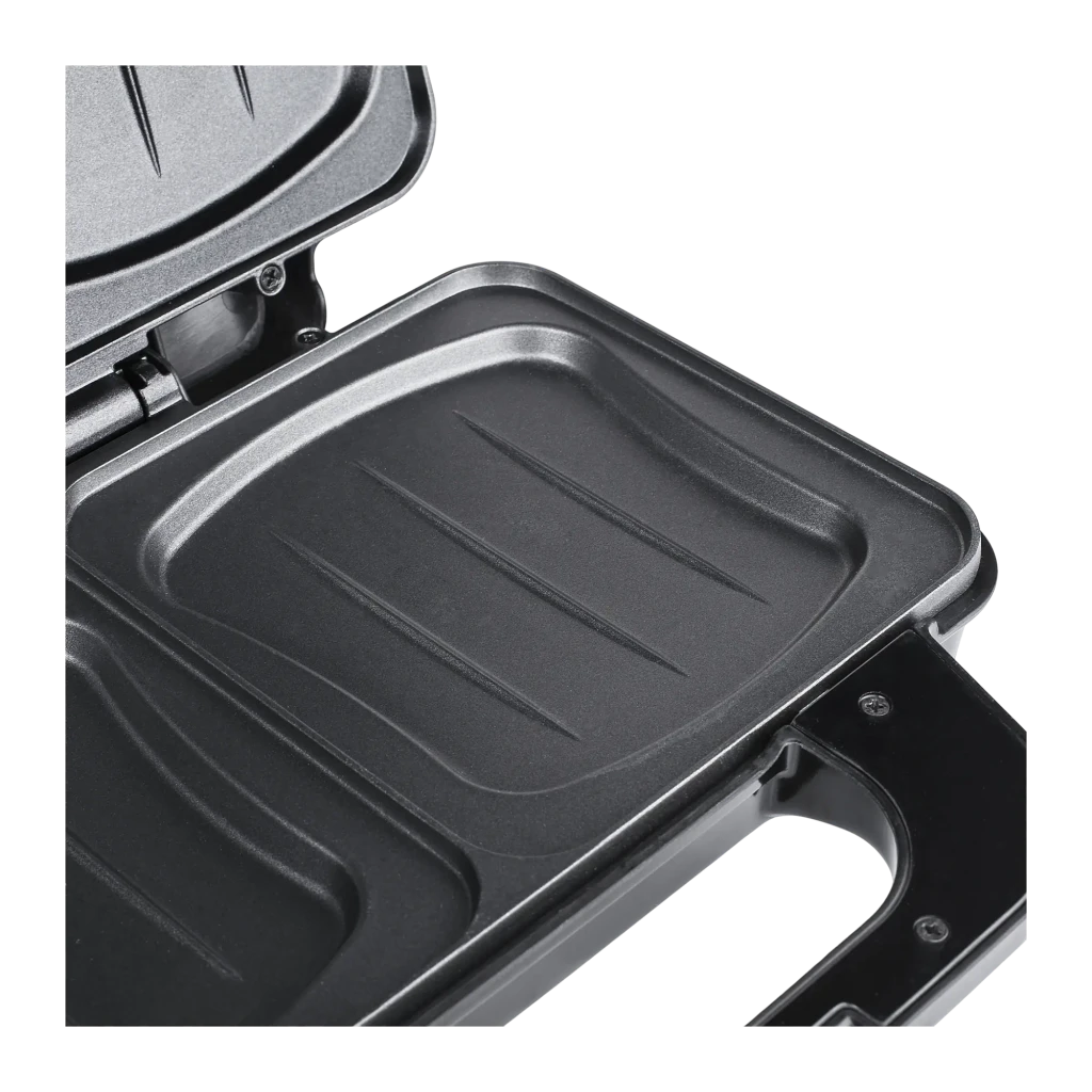 Sandwichera TriStar Antiadherente 900W Negro SA-3060, detalle: placa inferior antiadherente con ranuras y tapa abierta