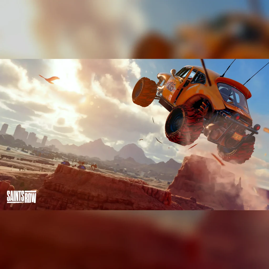 Videojogo Deep Silver Saints Row Day One Edition Xbox One, em uso: buggy laranja a saltar sobre rochas do deserto com logo