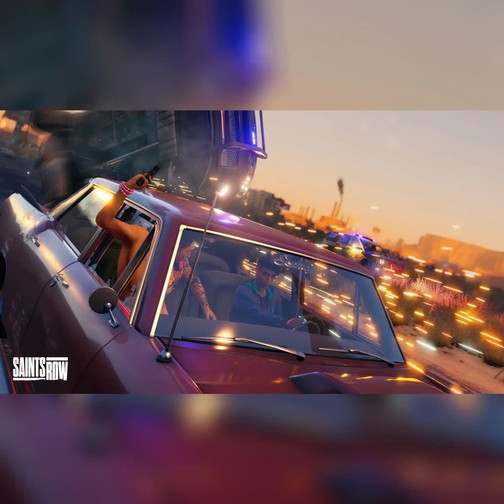 Videojogo Deep Silver Saints Row Day One Edition Xbox One, em uso: perseguição policial ao pôr do sol com personagens