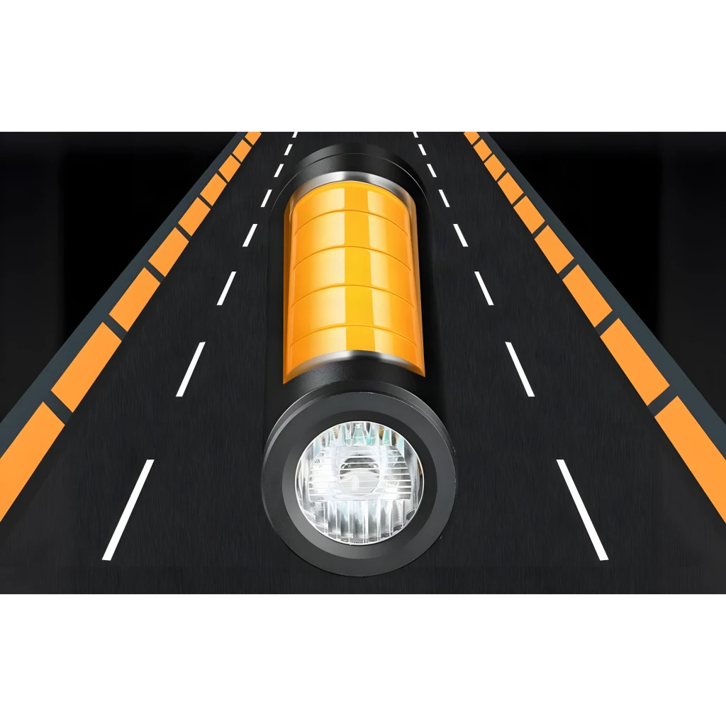 Luz delantera Superfire BL30 Negro 500 lúmenes 7h, vista cenital: lente frontal y cuerpo naranja sobre carretera