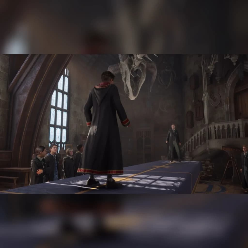 Videojogo Warner Bros Games Hogwarts Legacy Standard Xbox Series X, em uso: estudante de costas com túnica em salão