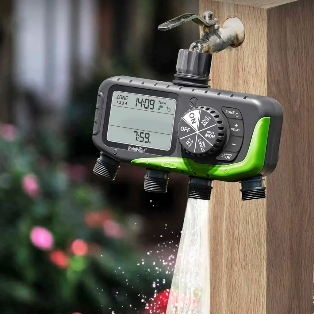 Programador de riego RainPoint IP65 4 zonas independientes 4 pilas AA ITV447, en uso: instalado en grifo exterior con agua