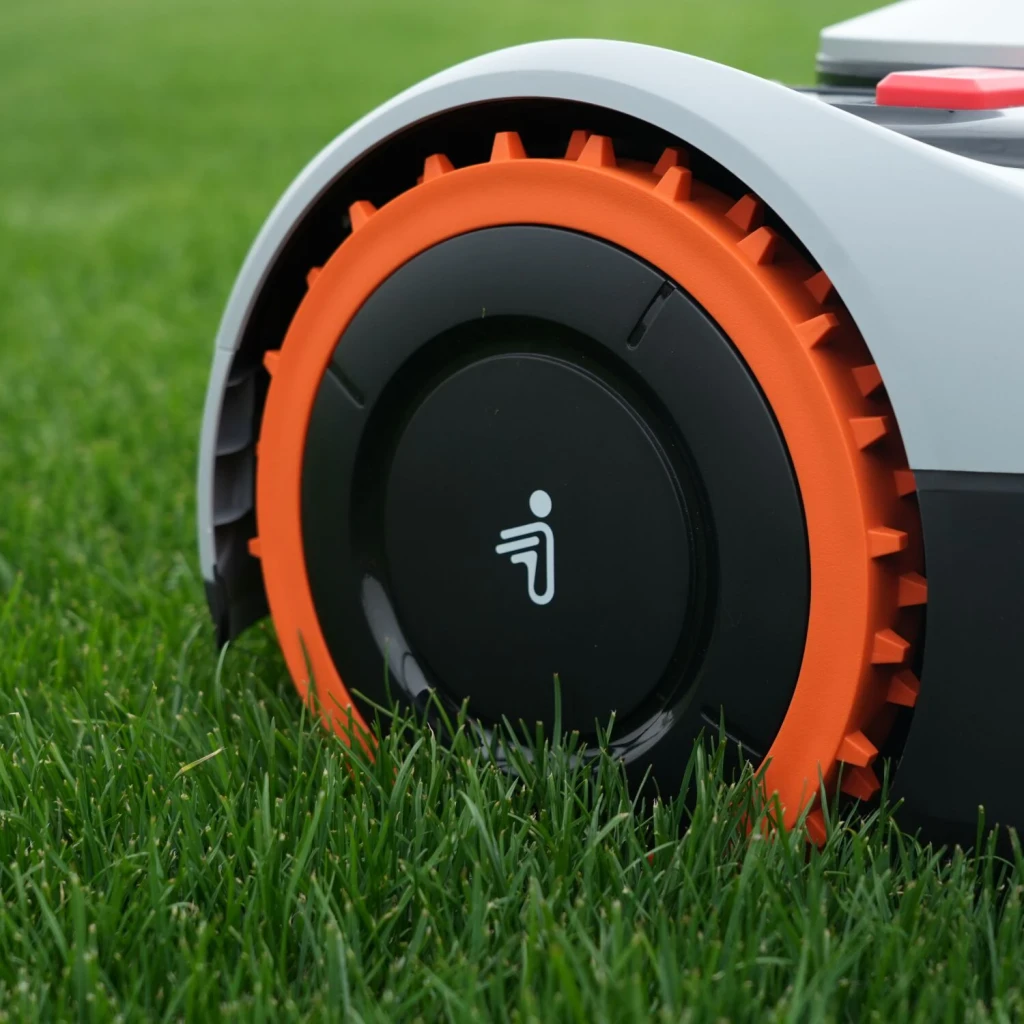 Segway Navimow Rodas Todo-o-Terreno Série I1 Preto/Laranja Chave Allen incluída, em uso: roda laranja e preta com logo i