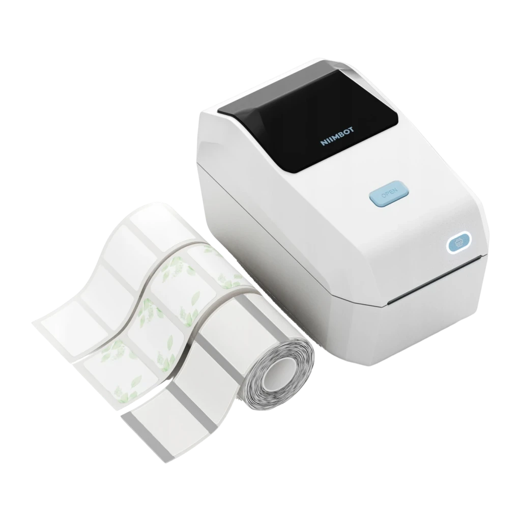 Impresora de Etiquetas Niimbot K3 Crema, vista frontal: cuerpo crema con panel negro, botón OPEN azul y rollo de etiquetas