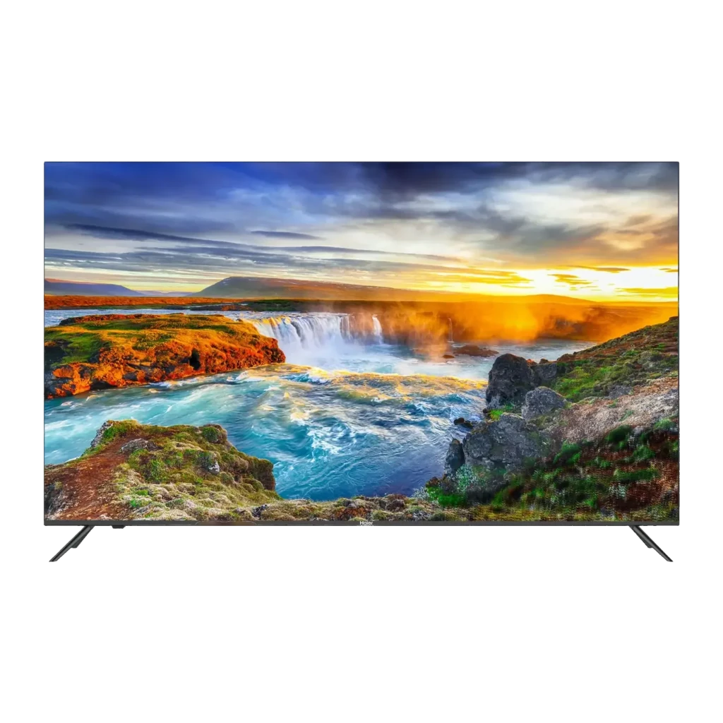 TV Haier 32 polegadas LED Full HD Preto H32K702FG, vista frontal: ecrã ligado com paisagem de cascata e dois pés