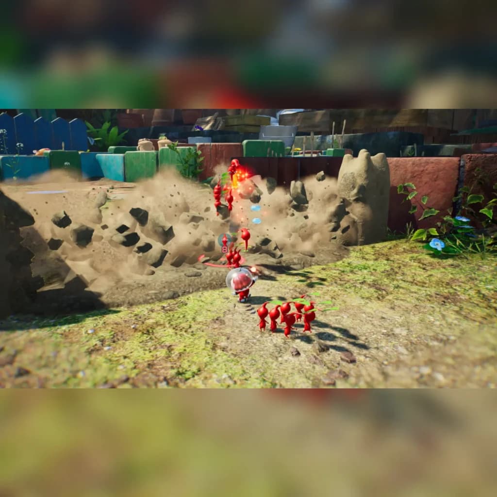 Jogo Pikmin 4 da Nintendo para a Switch (Edição Padrão), em uso: capitão e Pikmins vermelhos atacando inimigo em cenário