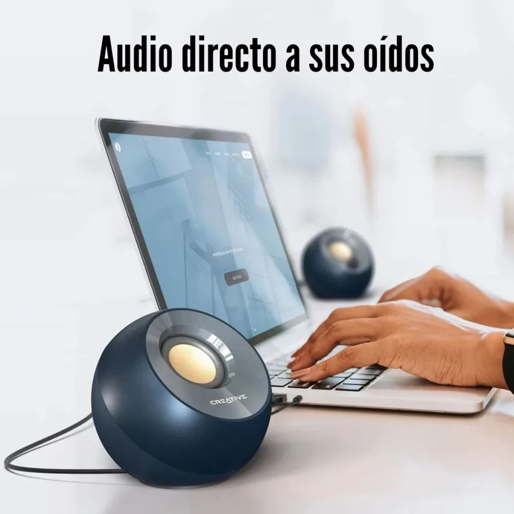 Altavoces Creative Labs Pebble 4,4W RMS Jack 3,5mm, USB Negro, en uso: altavoz frontal iluminado junto a portátil