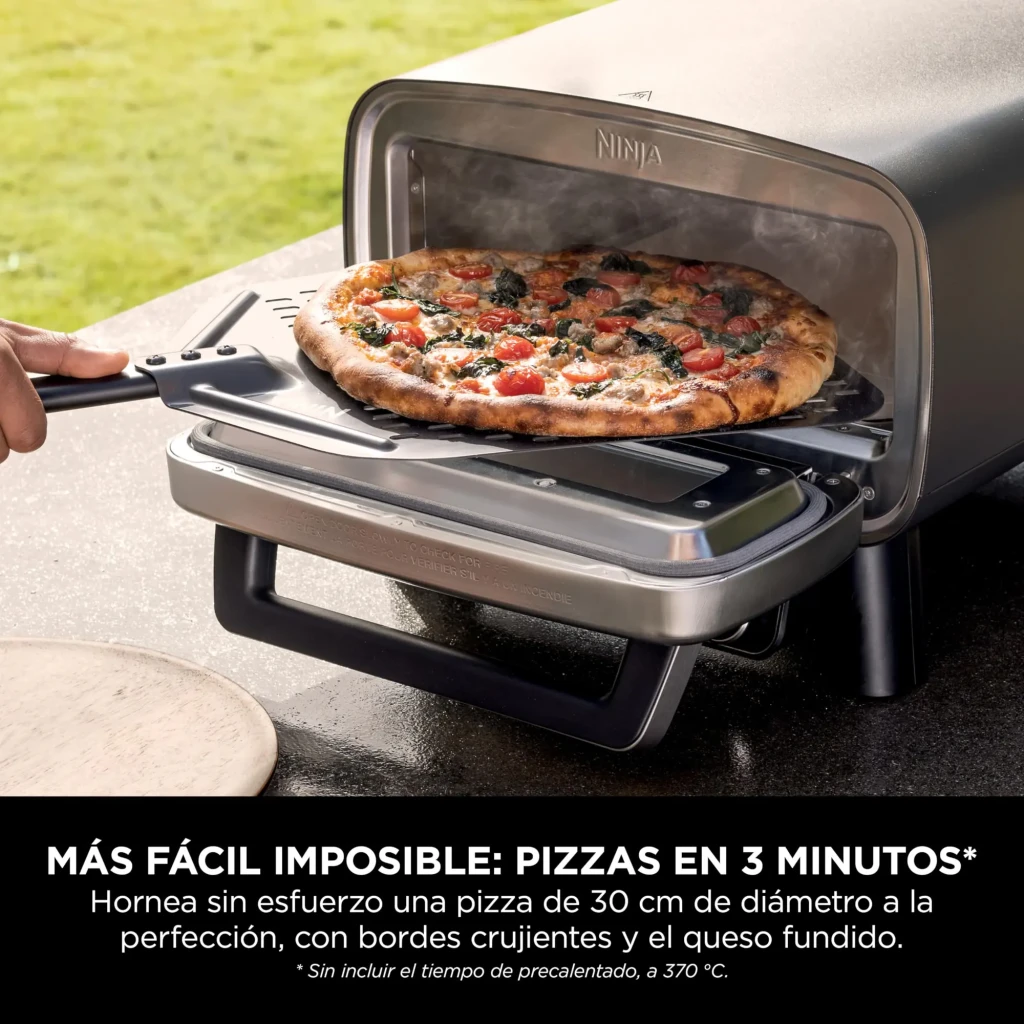 Four à pizza Ninja Artisan 1760W Acier Inoxydable MO201EU, utilisation: pelle glissant une pizza cuite avec tomates