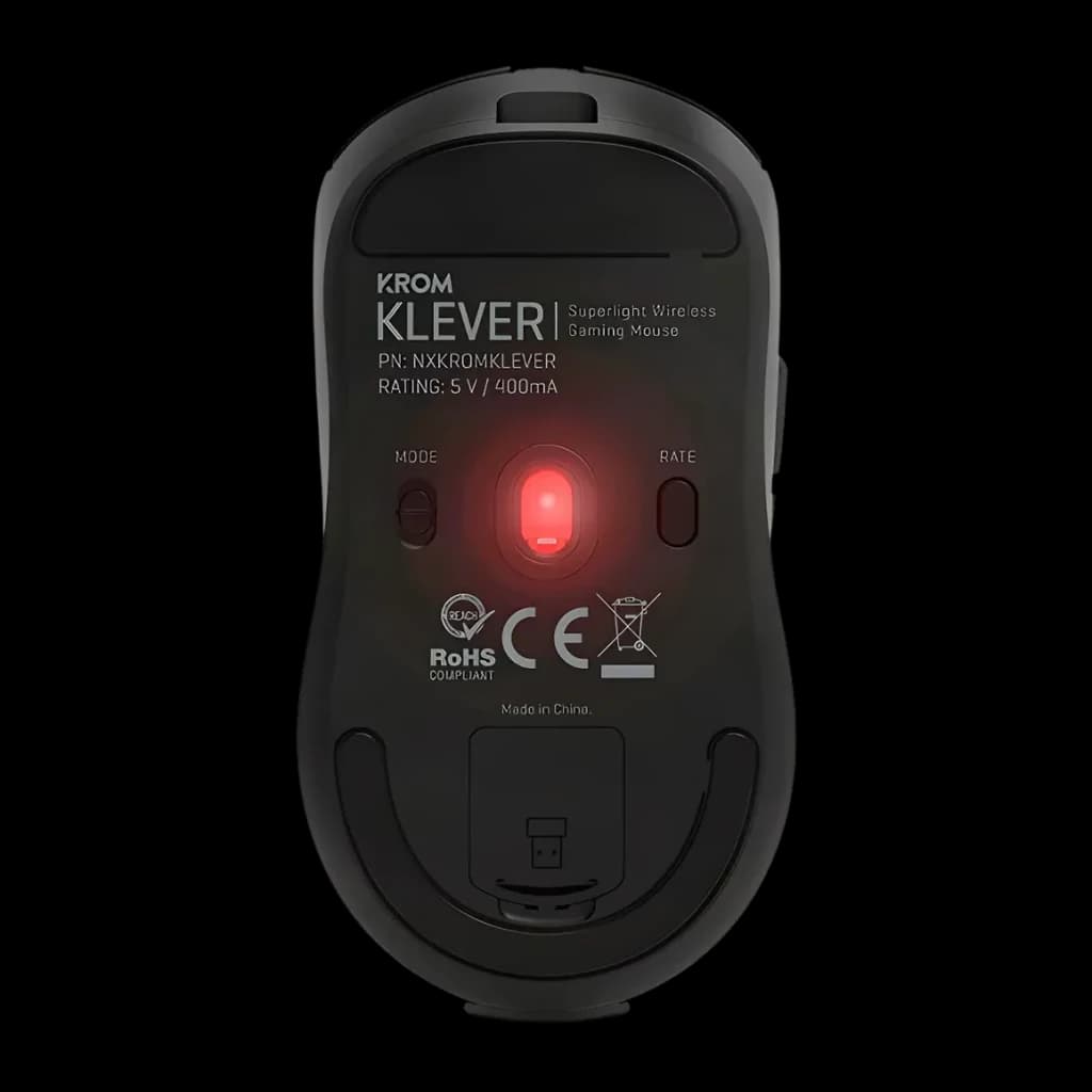 Souris Gaming Krom Klever Sans Fil 10000 DPI Noir, vue inférieure: capteur optique rouge, boutons MODE et RATE, logement