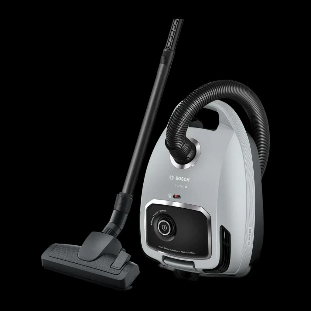 Aspirateur traîneau Bosch Série 6 Noir/Gris 600W BGB6X330, vue latérale: corps gris avec panneau noir, flexible et tube