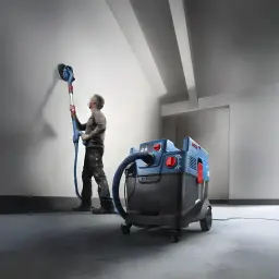 Aspirateur industriel sec/humide Bosch GAS 400 A Professional Bleu Sans Fil 1200W, en utilisation: opérateur ponçant un mur