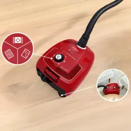Aspirateur avec sac Bosch Série 4 Rouge 600W BGD38RD1H, en cours d'utilisation: vue plongeante sur parquet, molette