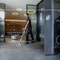 Aspirador de tapetes Kärcher Puzzi 10/1 Cinzento Preto/Amarelo 22kPa 1250W Húmido, uso: operadora limpa tapete de entrada