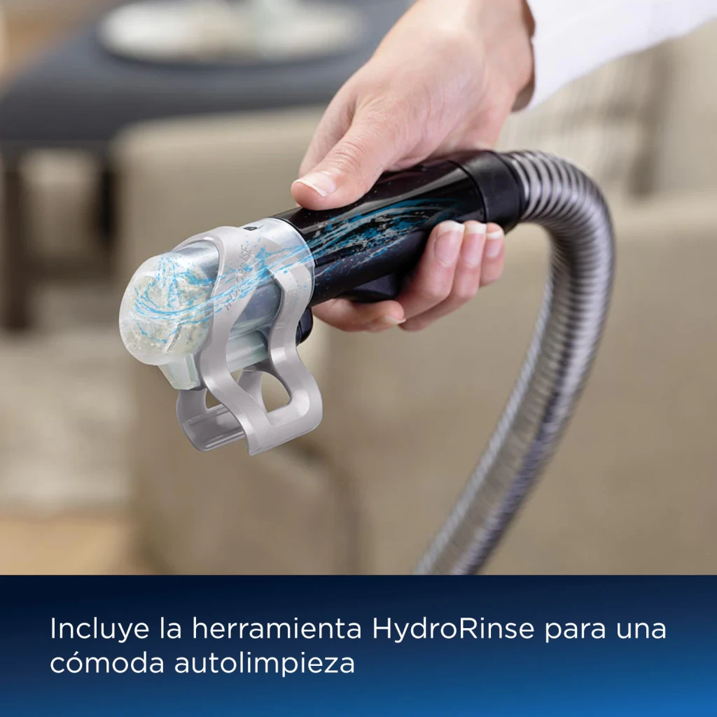 Aspirateur à main BISSELL SpotClean Plus 3724N Noir 330W, détail: main tenant l'outil HydroRinse avec tuyau flexible