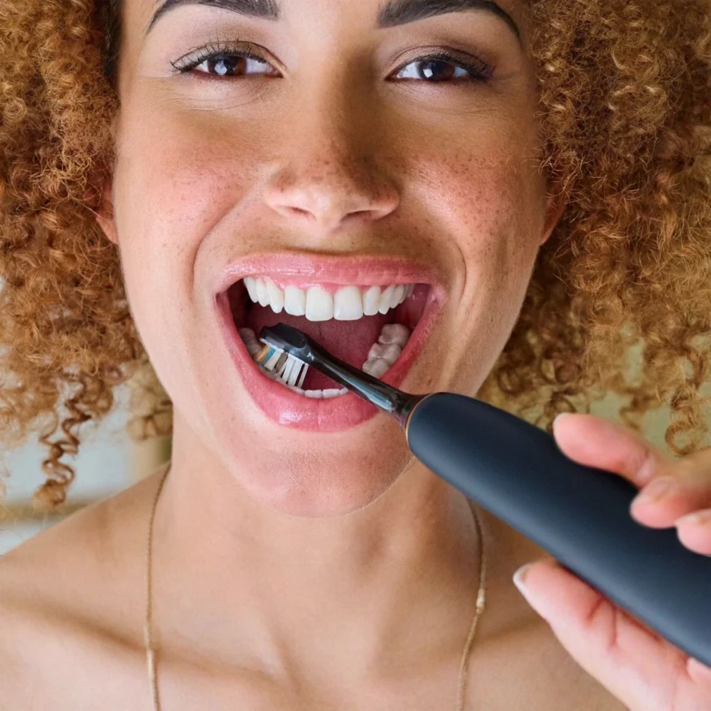 Cabeça de escova elétrica Philips Sonicare A3 Premium All-in-One Pack 2 Preto HX9092/88, uso: mulher a escovar os dentes