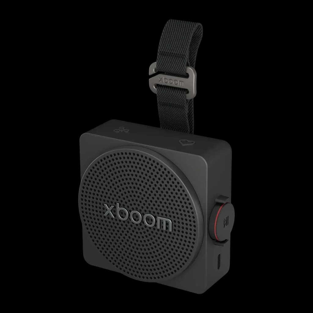 Altavoz portátil LG XBoom Mini by will.i.am IP67 5W 10h Negro, vista frontal en ángulo: rejilla circular, correa y botón