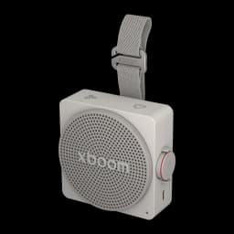 Altavoz portátil LG xboom Mini by will.i.am IP67 5W 10h Gris, vista frontal en ángulo: rejilla circular, correa textil