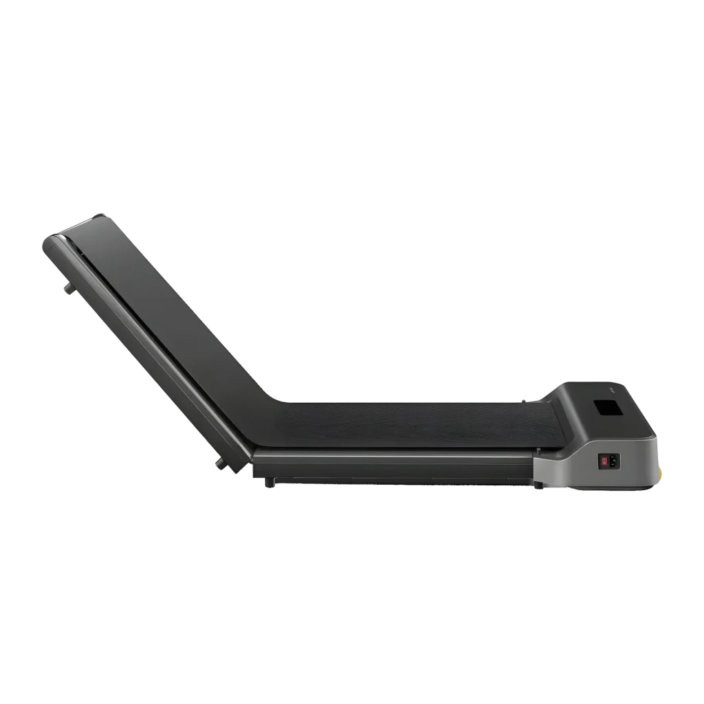Passadeira KingSmith WalkingPad Z1 Fold Cinzento Dobrável 6km/h, vista lateral: dobrada em ângulo com tapete e motor visíveis