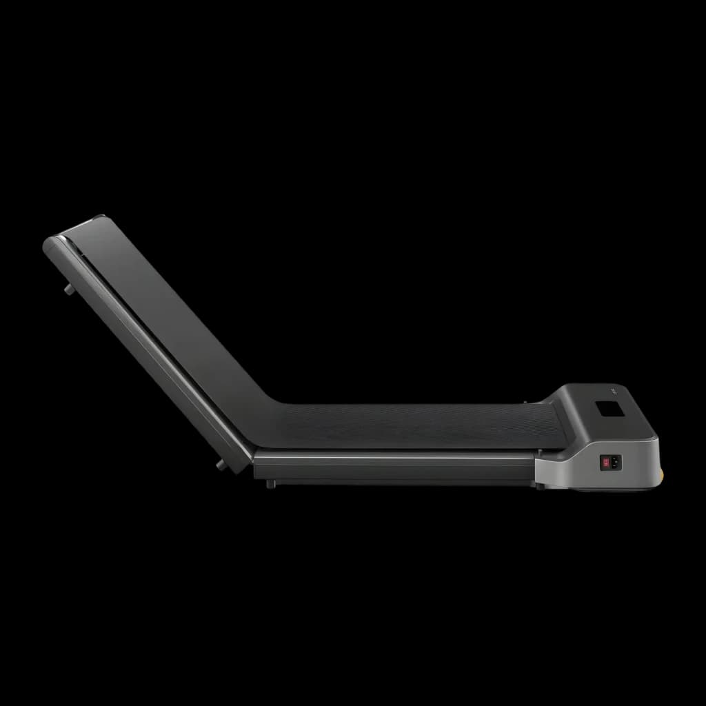 Passadeira KingSmith WalkingPad Z1 Fold Cinzento Dobrável 6km/h, vista lateral: dobrada em ângulo com tapete e motor visíveis