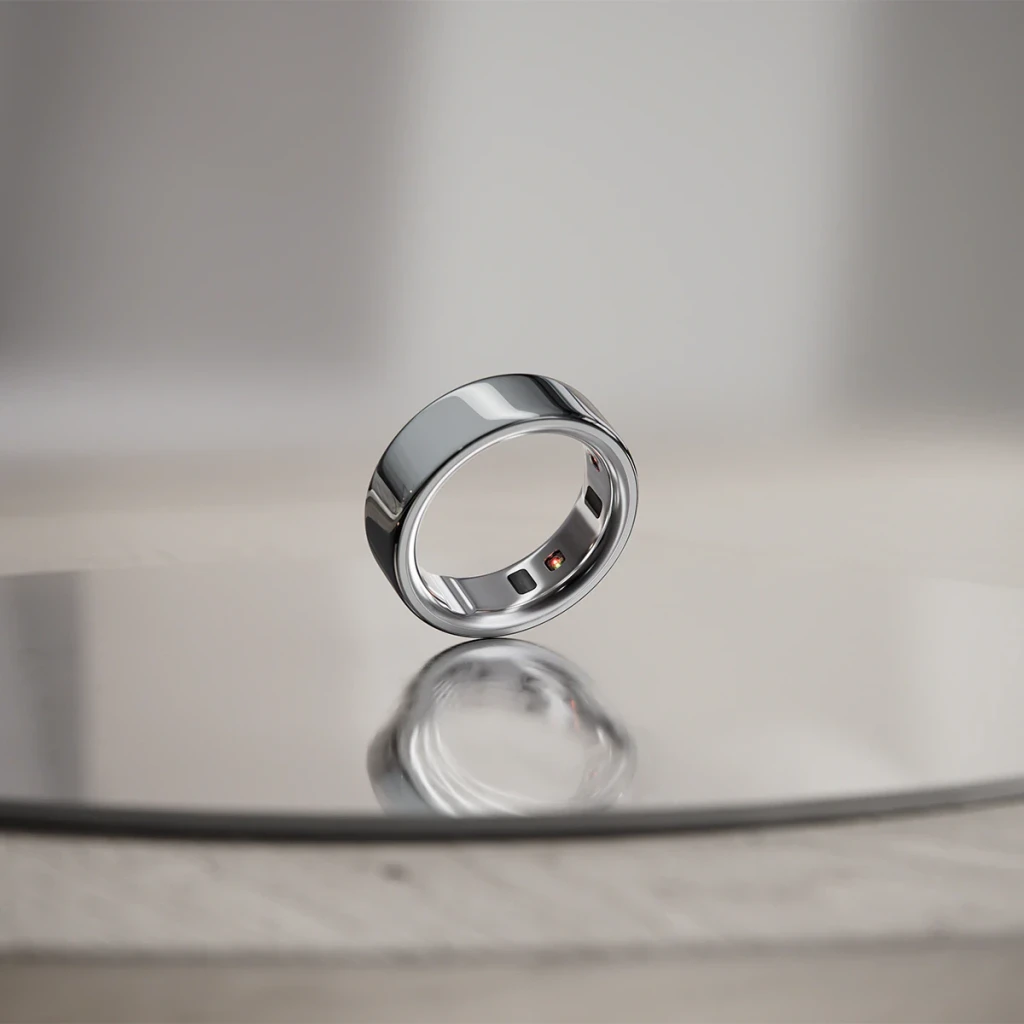 Oura Ring 4 Tamanho 11 Prata Temperatura Corporal Bateria 8 Dias Titânio, em uso: anel sobre superfície refletora, sensores